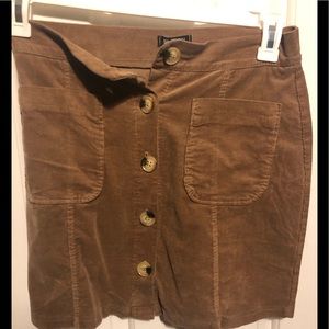 Brand new camel colored mini skirt